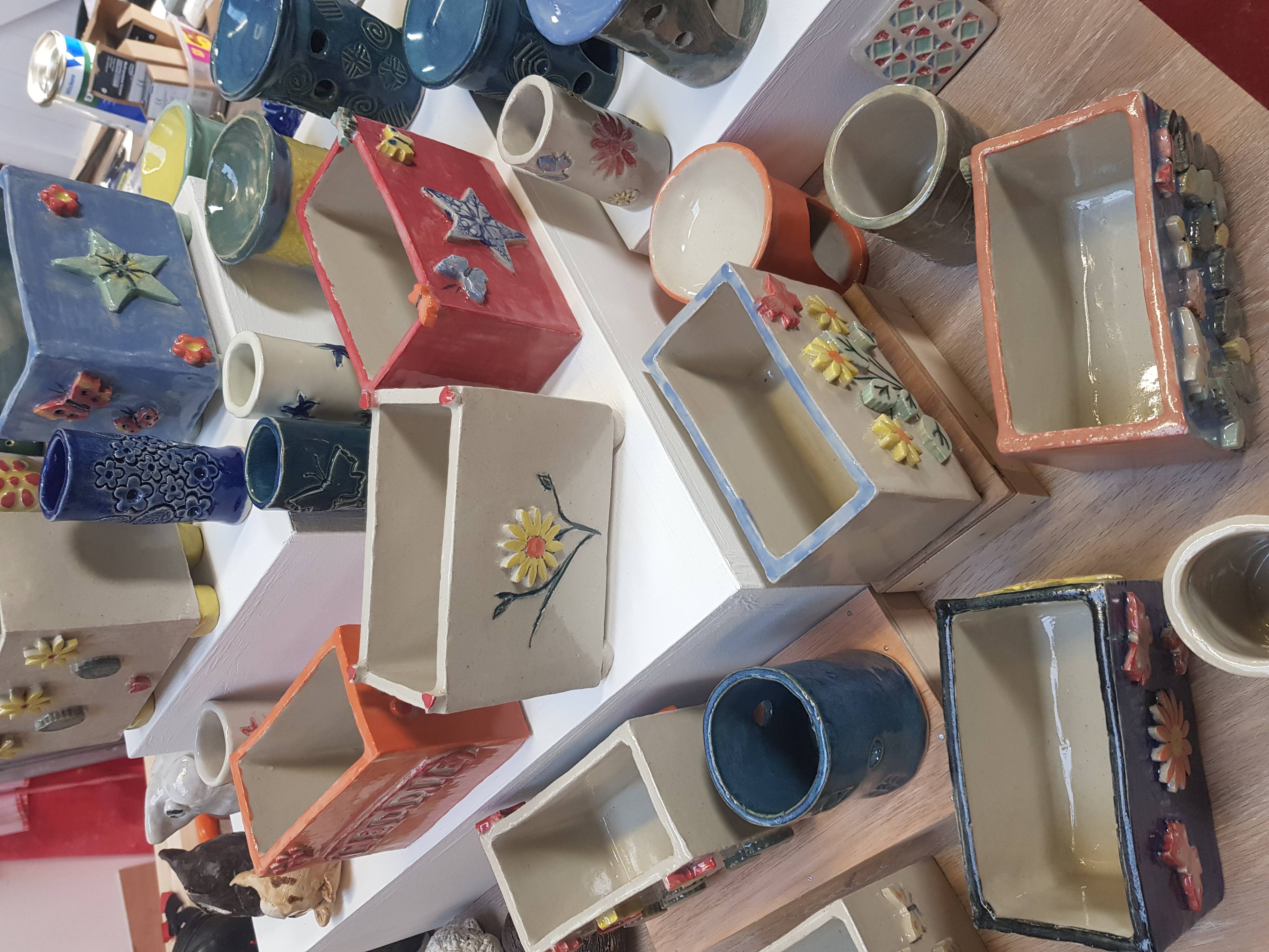 Workshop participants creating ceramic pieces